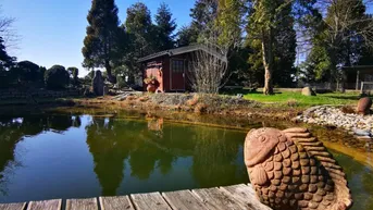 Expose Bungalow mit Schwimmteich - Ortsrandlage und viel Grund