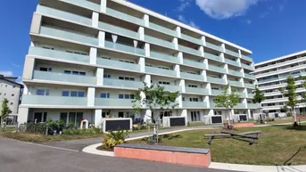 Expose Erstbezug - Lichtdurchflutete 2 Zimmer Neubauwohnung mit Fernblick, Balkon &amp; Tiefgaragenplatz