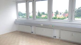 Expose Büro mit E-Ladestation