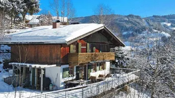Expose Exklusives Ferienhaus mit Hüttencharakter und Bergpanorama auf 1.000 Meter Seehöhe im Wander- und Skiparadies des Hochkönigs