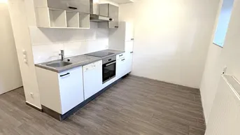 Expose 2-Zimmer-Souterrain Wohnung mit Gemeinschaftsterrasse