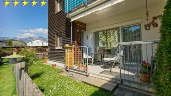 Expose Moderne, geförderte 3 Zimmer Wohnung mit Gartenzugang und Carport