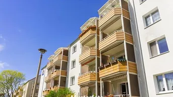 Expose Wohn- und Geschäftshaus mit Balkon