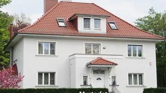 Expose Wohn- und Geschäftshaus mit Terrasse und Garage
