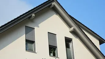 Expose Wohn- und Geschäftshaus mit Balkon