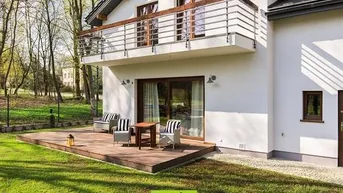 Expose Einfamilienhaus mit Badeteich