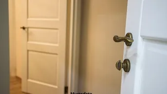 Expose 2-Zimmer-Wohnung mit 2 Stellplätzen und Gartenanteil
