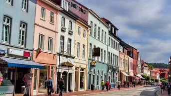 Expose Nur 500 m ins Zentrum - Wohnungen mit Garage in idealer Lage