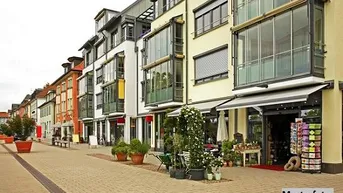 Expose Nur 500 m ins Zentrum - Wohnungen mit Garage in idealer Lage