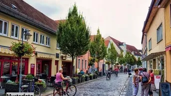 Expose Wohn- und Geschäftshaus mit Büroflächen, Carport und Stellplätzen