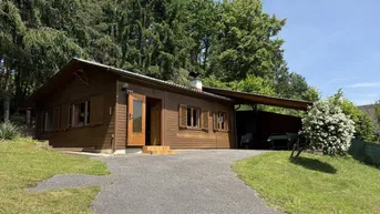 Expose *RUHELAGE* - Kleines Haus mit wunderschöner Aussicht auf über 1100m² sonnigem BAUGRUNDSTÜCK