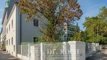 Expose Luxuriöse Stadtvilla mit Garten und Garagen in zentraler Grünlage