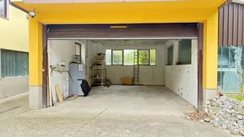 Expose Hohe Garage mit elektrischem Einfahrtstor !