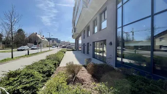 Expose Geschäftslokal mit großem Außenbereich - Edelrohbau - Q11 Leben am Fluss