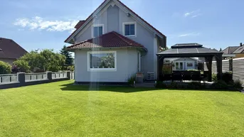 Expose Wohnen wie im Urlaub – Charmantes Einfamilienhaus mit Seezugang