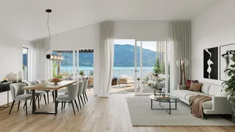 Helles Wohn- und Esszimmer mit Seeblick, Holzboden und Zugang zu einer großen Terrasse.