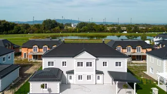 Expose Hochwertiges niedrigenergie Doppelhaus mit Carport und Seezugang !