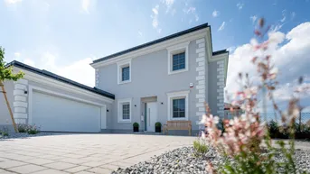 Expose ** Eleganz und Komfort: Stilvolle und energieeffiziente Residenz mit Seezugang und Doppelgarage **