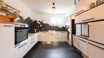 Expose Neuwertige Gartenwohnung mit Terrasse und 2 Garagenplätze
