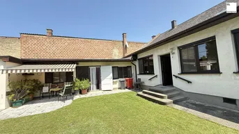 Expose Famillienidylle: großes Einfamilienhaus mit Veranda und Wirtschaftsanbau mit wunderschönem uneinsichtigen Garten + DG-Ausbaupotential!