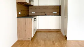 Expose Gartenwohnung mit moderner Einbauküche und Tiefgaragenstellplatz