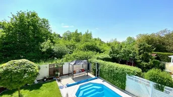 Expose Großzügige Doppelhaushälfte mit Gartenparadies und Pool