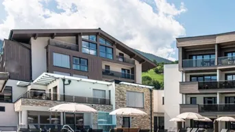 Expose Bestlage Pinzgau mit ca. 6% Rendite! Sieben Apartments mit Terrassen, Balkonen und beheiztem Aussenpool