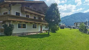Expose Hochattraktives Appartementhaus in Tiroler Landhausstil in Zentrumslage