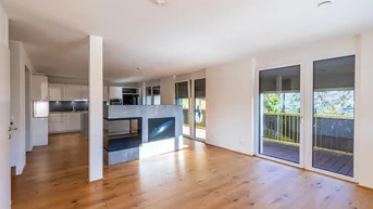 Expose Design trifft Ausblick: Maisonette mit großzügiger Dachterrasse und Dachgarten