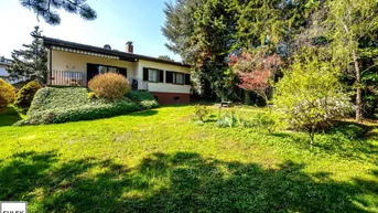 Expose Tirolerhof Siedlung: sanierungsbedürftiges Einfamilienhaus im Grünen