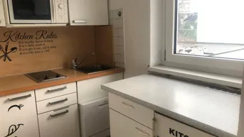 Expose 1-Zimmer-Wohnung mit separater Küche + Tiefgaragen-AP