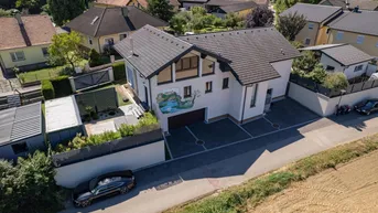 Expose Exklusives Einfamilienhaus mit Ausblick und Wellnessbereich