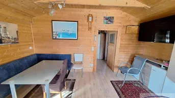Expose Gemütliches Holzhaus in Sonnenlage - Ihr Ruhepol im Grünen! 