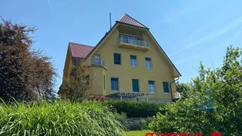 Expose Attraktive und charmante Dreizimmer-Dachgeschoßwohnung mit herrlichem Seeblick