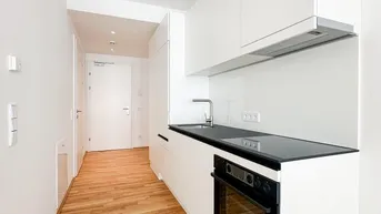 Expose Nähe U1 Station Kaisermühlen - Singlewohnung mit optisch abgetrenntem Schlafbereich - Neubau