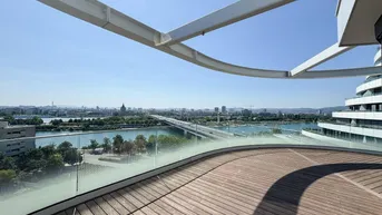 Expose Lichtdurchflutete Dachgeschosswohnung mit beeindruckendem Panoramablick auf die Donauinsel
