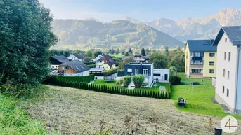 Expose Baugrundstück mit Panoramablick auf die Berge