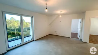 Expose Erstbezug im Herzen von Deutsch-Wagram: Moderne Dachgeschoss-Wohnung mit Balkon, Fußbodenheizung und Parkplatz