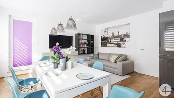 Helles Wohn- und Esszimmer mit modernem Esstisch, Sofa und Holzboden, ideal für gesellige Stunden.
