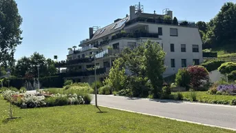 Expose Moderne Dachgeschosswohnung in eigener Parkanlage und Schwimmteich