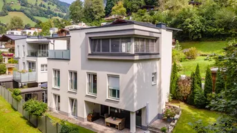 Expose Elegante Maisonette-Wohnung mit Garten und sonnigen Terrassen