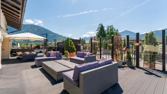Expose Eleganz trifft Gemütlichkeit: Exklusive Wohnung mit großzügiger Terrasse