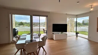 Expose EXKLUSIVES WOHNEN IN „THE SHORE“ – MIT PRIVATEM GARTEN, TERRASSE &amp; DONAUBLICK UND GARAGE