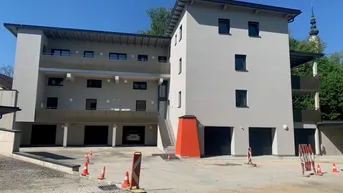 Expose Erstbezugs - Maisonettewohnung mit Reihenhauscharakter mit überdachter Terrasse und Garage