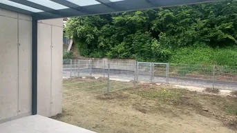 Expose Erstbezugs - Maisonettewohnung mit Reihenhauscharakter mit überdachter Terrasse und Garage