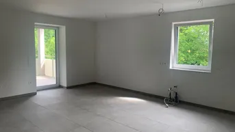Expose Erstbezug: exklusive Maisonette-Wohnung mit großzügigem Balkon in Grünlage