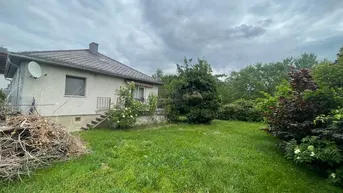 Expose Großzügiges Eckgrundstück mit solidem Einfamilienhaus in Münchendorfer Ruhelage zu verkaufen!