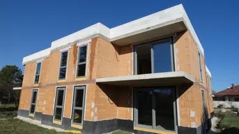 Expose NATURNAHE NIEDRIGENERGIE NEUBAUWOHNUNG MIT TERRASSE UND EIGENGARTEN