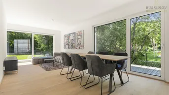 Expose Erstbezug in Bestlage: Modernes Eck-Reihenhaus mit Garten und Tiefgarage