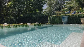 Expose Exklusive Stadtoase mit Eigengarten und Pool Nähe American International School!
